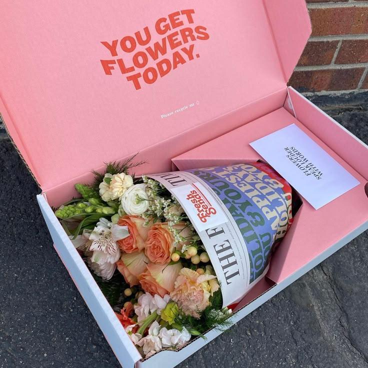 Professional floral arrangement in modern corporate setting